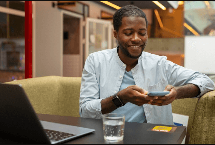Image of a boy making payment