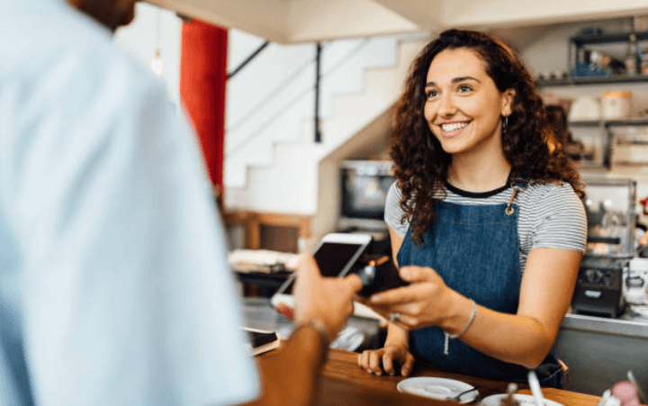 Image of a girl making payment